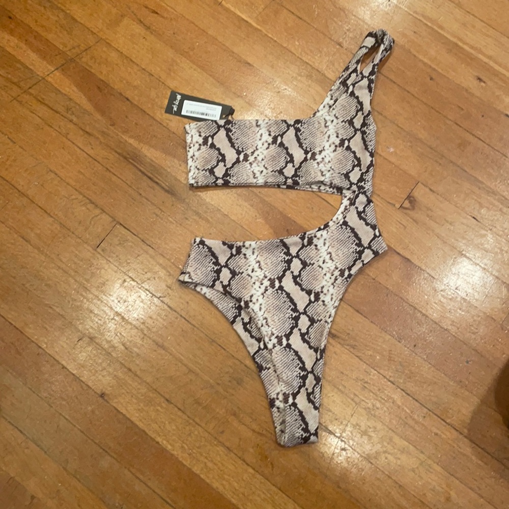 Nasty gal one piece cut out swimsuit. Brand new